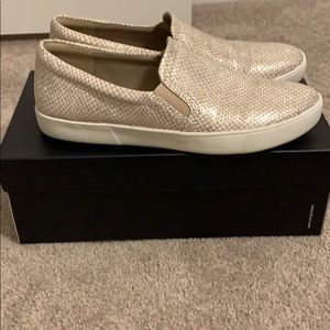 Gold textured slip on sneakers